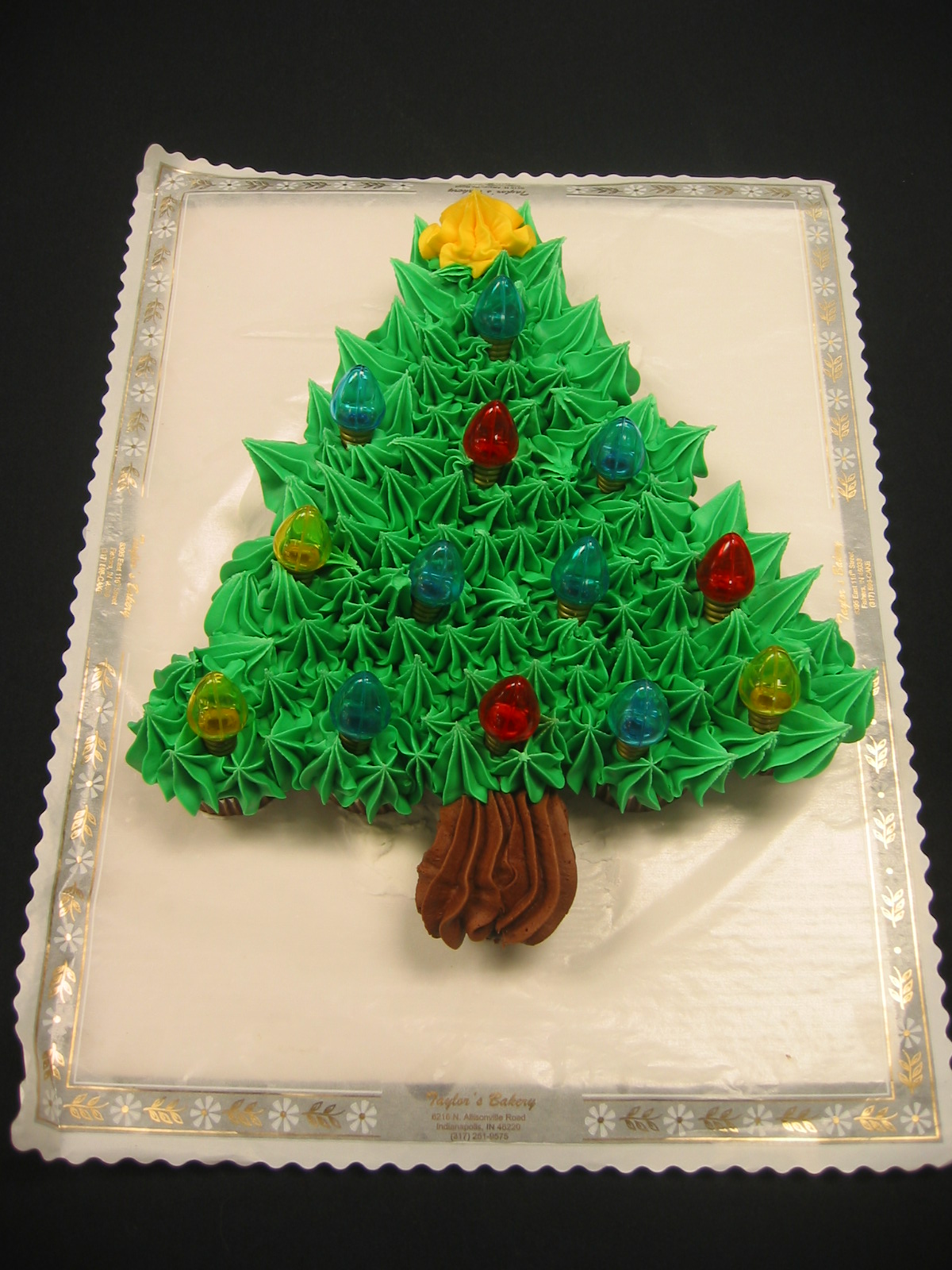 A Christmas tree cake with the baking … – License Images